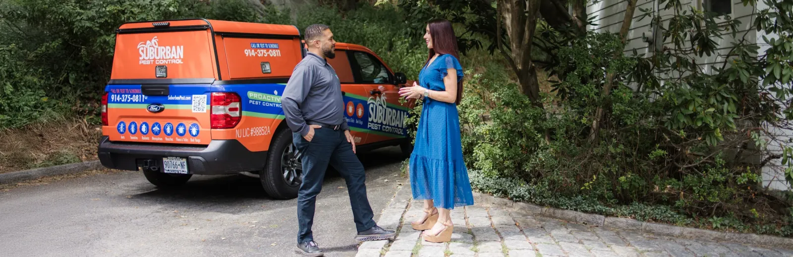 technician and customer talking outside of home