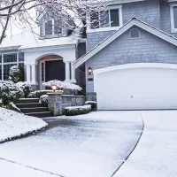 home covered in snow during the winter