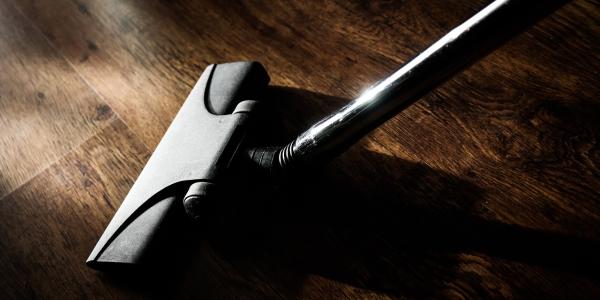 Vacuum Cleaner on Wooden Floor