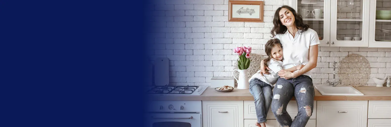 mom and daughter in kitchen laughing
